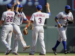 Jugadores de los Mets celebran la victoria obtenida sobre los Mellizos de Minnesota. AFP /