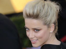 Amber Heard declaró prefiere mantener en lo privado su romance con Johnny Depp. ARCHIVO /