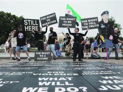 Los partidarios del soldado raso Bradley Manning se manifiestan frente a la Casa Blanca. AP /