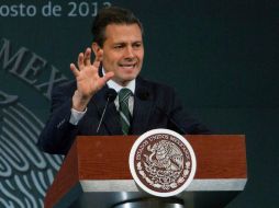 El Presidente Peña Nieto saldrá del país el domingo 1 de septiembre, luego de entregar su Primer Informe de Gobierno al Congreso. ARCHIVO /