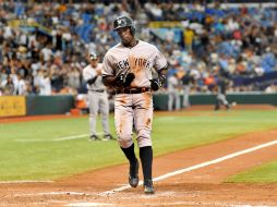 Alfonso Soriano anota una de las carrera de los Bombarderos dle Bronx en el partido. AFP /