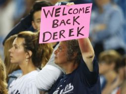 Los aficionados de los Yankees se muestran emocionados ante el regreso de Derek Jeter. AFP /