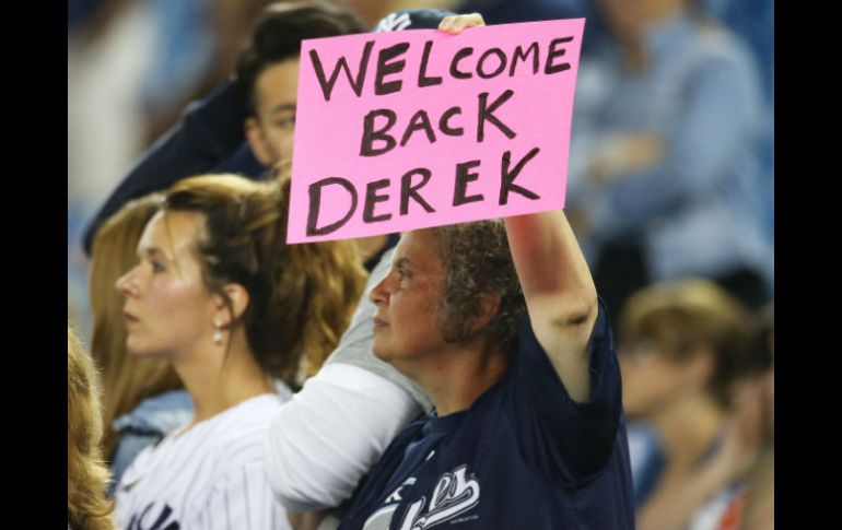 Los aficionados de los Yankees se muestran emocionados ante el regreso de Derek Jeter. AFP /