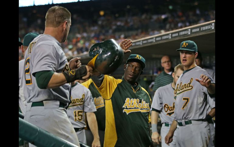 Los Atléticos de Oakland celebran su victoria ante los Tigres de Detroit. AFP /