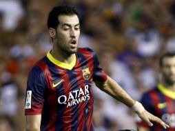 Sergio Busquets terminó lastimado después del encuentro ante Valencia. EFE /