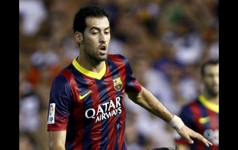 Sergio Busquets terminó lastimado después del encuentro ante Valencia. EFE /