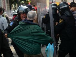 Los cargos que se les adjudican incluyen posesión de armas blancas u objetos aptos para agredir. AFP /