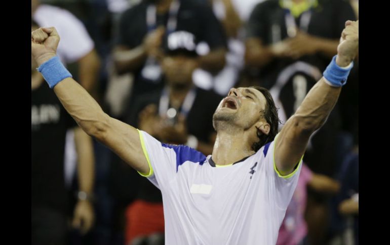 David Ferrer celebra luego de que terminara el partido contra Janko Tipsarevic. AP /