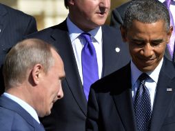 Putin charla con Obama, durante la cumbre del G-20. AFP /