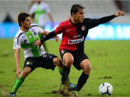 La lluvia ensució el juego anoche en el Jalisco. MEXSPORT /