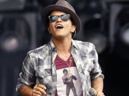 Bruno Mars se unirá a la lista de artistas que han amenizado el evento deportivo. ARCHIVO /