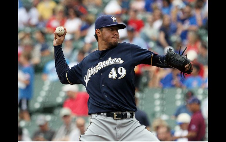 Con labor de siete episodios, el serpentino Yovani Gallardo logró su victoria 11 de la presente temporada de MLB. AFP /