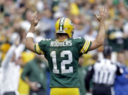 Aaron Rodgers tuvo un partido redondo en el que maniató a la defensiva de los Pieles Rojas. AP /