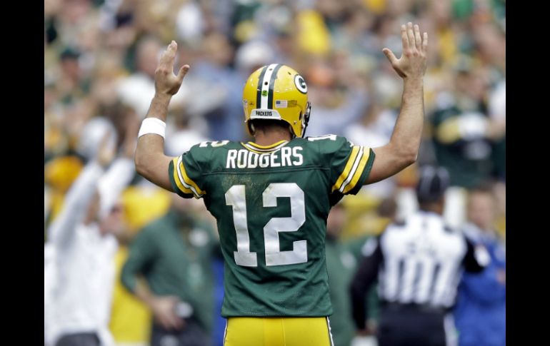 Aaron Rodgers tuvo un partido redondo en el que maniató a la defensiva de los Pieles Rojas. AP /