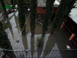 Aspecto de una casa inundada en Tamazula.  /