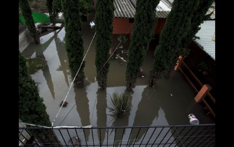 Aspecto de una casa inundada en Tamazula.  /