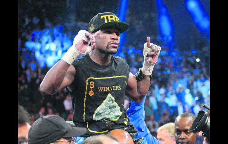 Mayweather Jr. se alzó con el triunfo en la Arena MGM Grand, que recaudó más de 20 millones de dólares por concepto de boletos. AP /