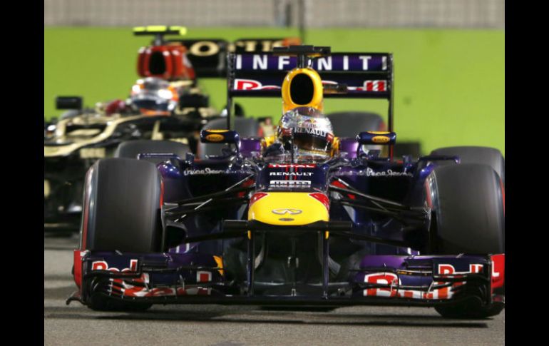 Sebastian Vettel registró un tiempo de 1:42.841 para ganar el derecho a liderar el Gran Premio de Singapur. EFE /