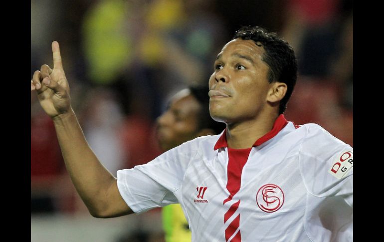 Bacca anota un doblete para que el cuadro sevillano respire. EFE /