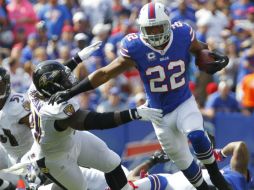 Fred Jackson (22) colaboró a la ofensiva de Buffalo para imponerse a los Cuervos. AP /