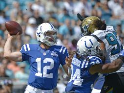 Andrew Luck (12) comandó una fácil vicotoria de los Potros frente a los Jaguares. AP /