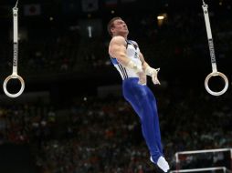 A Arthur Zanetti le siguen el ruso Aleksandr Balandin, que se llevó la plata y Brandon Wynn, de EU, con el bronce. AP /