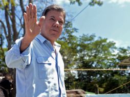 Juan Manuel Santos expresa su confianza de llegar a un acuerdo a un año de comenzar con los Diálogos de Paz. AFP /