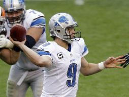 Matthew Stafford tuvo una tarde en la que lanzó cuatro pases de anotación. AP /