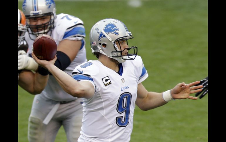 Matthew Stafford tuvo una tarde en la que lanzó cuatro pases de anotación. AP /