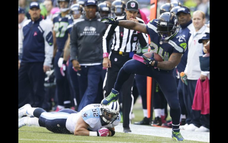 Marshawn Lynch (24) fue el motor ofensivo de Seattle. AP /