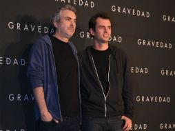 Alfonso Cuarón, viejo lobo del cine mexicano, junto a su hijo Jonás. AP /