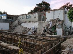 La antigüedad del edificio, errores en la construcción, y la sobrecarga en el mismo, fueron factores determinantes en el derrumbe. ARCHIVO /