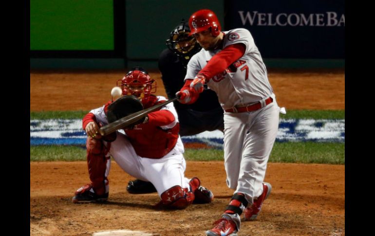 Los Cardenales evitaron la blanqueada en el noveno, cuando Matt Holliday bateó un jonrón solitario ante Ryan Dempster. AFP /