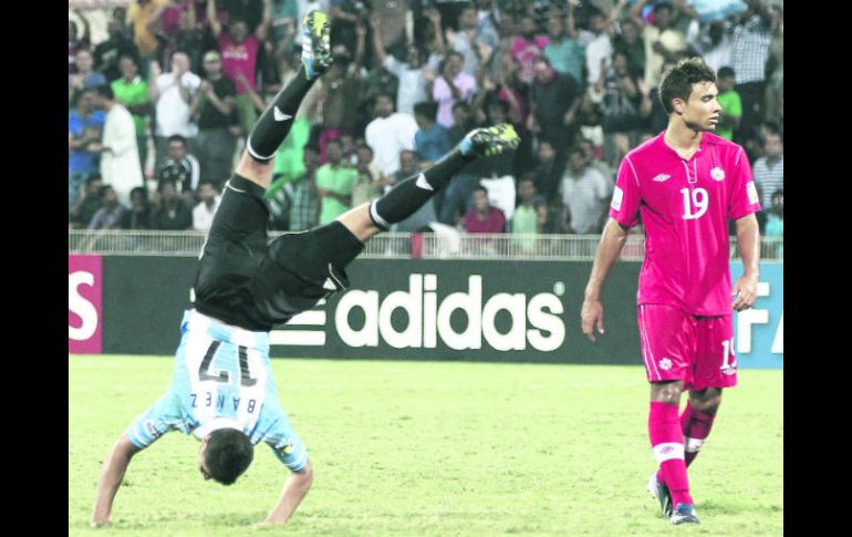 Los argentinos se colocaron en la siguiente fase al derrotar a Canadá por 3-0 en el último duelo de su grupo. EFE /