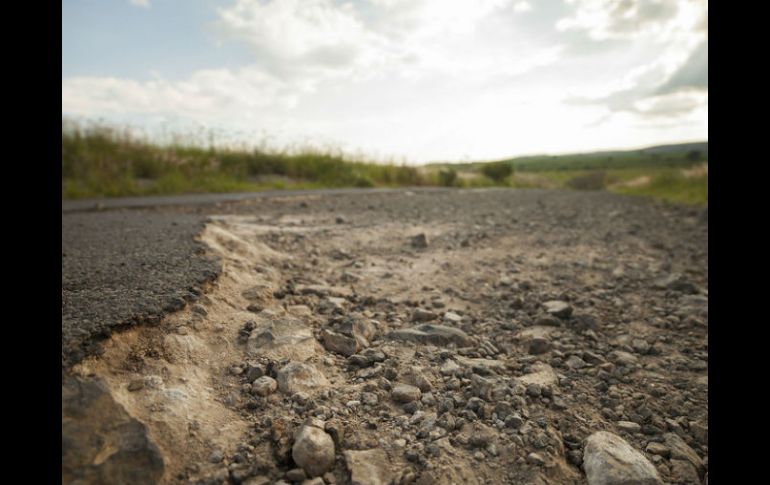 Las carreteras están siendo reparadas luego de que el huracán ''Manuel'' provocara daños. ARCHIVO /