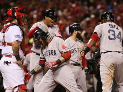 Con jonrón de Gomes, los Medias Rojas vencen este domingo a los Cardenales. AP /