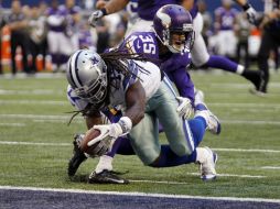 Dwayne Harris anotó a pase de Tony Romo en los últimos momentos del encuentro. AP /