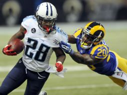 Chris Johnson (28) corrió para 150 yardas en la victoria de los Titanes. AP /