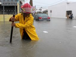 Hasta el momento, no se tiene reporte de pérdidas humanas por la depresión tropical que impactó en Sinaloa. AP /