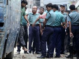 La justicia de Bangladesh condenó hoy a muerte a 152 de unos 850 acusados de asesinato por el motín en el que fallecieron 74 personas. EFE /