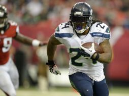 Marshawn Lynch fue una pesadilla para la defensa de Atlanta. AP /