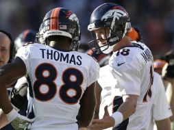 Peyton Manning y Demaryius Thomas se conectaron para tres anotaciones. AP /