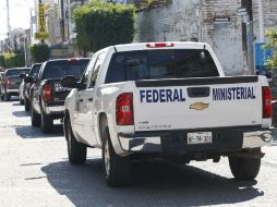 Elementos de la Policía se encuentran trabajando para encontrar a los agentes.  /