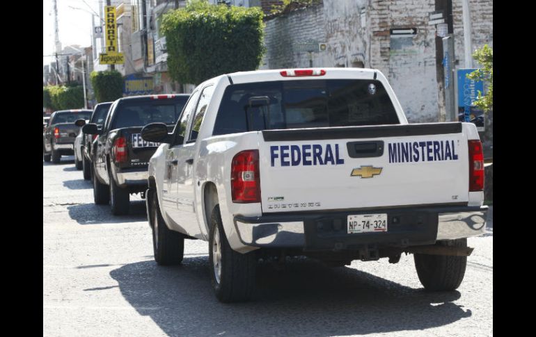 Elementos de la Policía se encuentran trabajando para encontrar a los agentes.  /