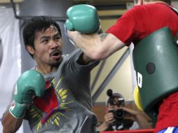 Manny se preocupa por sus 'paisanos' y exhorta a todos a orar por las víctimas. AP /