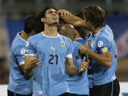 El equipo sudamericano tiene ya casi segura su presencia en la Copa del Mundo. AFP /