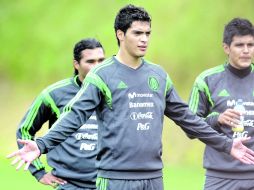 Raúl Jiménez espera celebrar esta próxima madrugada junto a sus compañeros el pase de México al mundial de Brasil. AP /