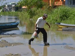 Cerca de 80 mil 737 personas fueron afectadas por las inundaciones generadas por el desbordamiento de ríos. ARCHIVO /