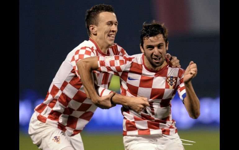 Los de Croacia festejan su pase a la próxima copa del mundo. AFP /