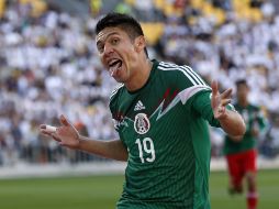 Peralta fue el hombre clave del repechaje para el Tri. AFP /